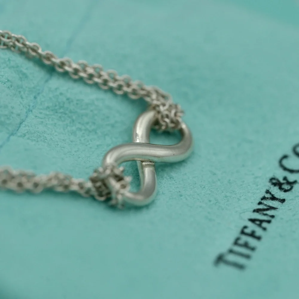 Tiffany & Co. Silver Infinity Pendant Necklace - Picture 7 of 9